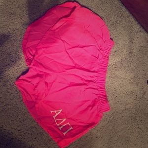 Neon pink ADPi athletic shorts